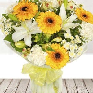 Sunshine bouquet, yellow gerberas and white lilies are the key flowers