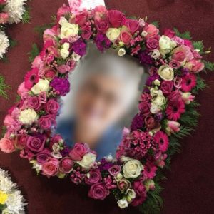 Picture frame of flowers with portrait inside